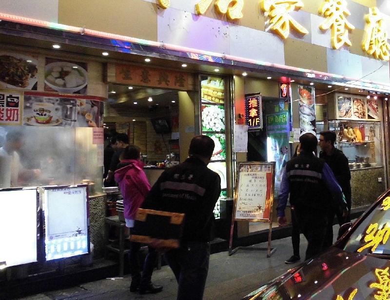 Tobacco Control Inspectors conduct an inspection at a restaurant.