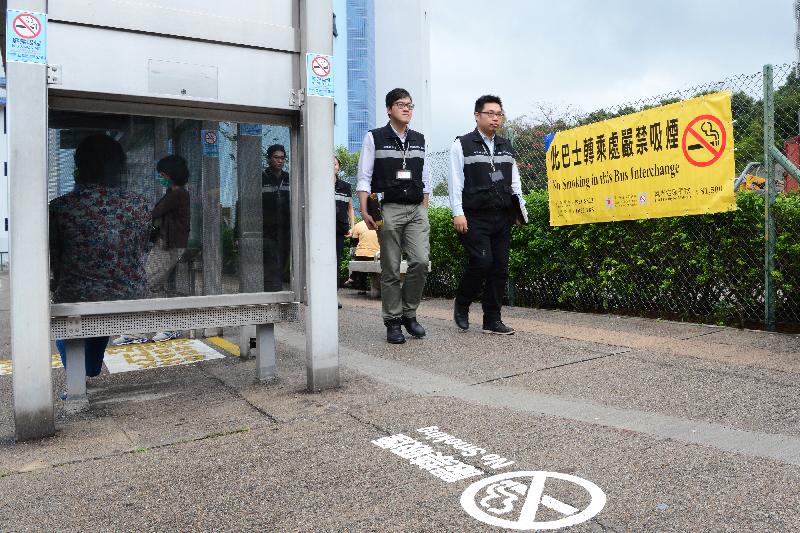 Tobacco Control Inspectors inspect a bus interchange at a tunnel portal area.