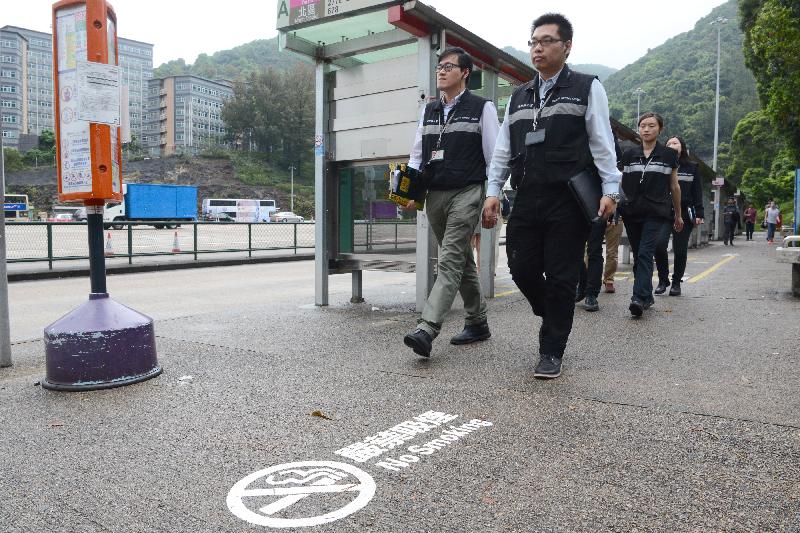 Tobacco Control Inspectors inspect a bus interchange at a tunnel portal area.